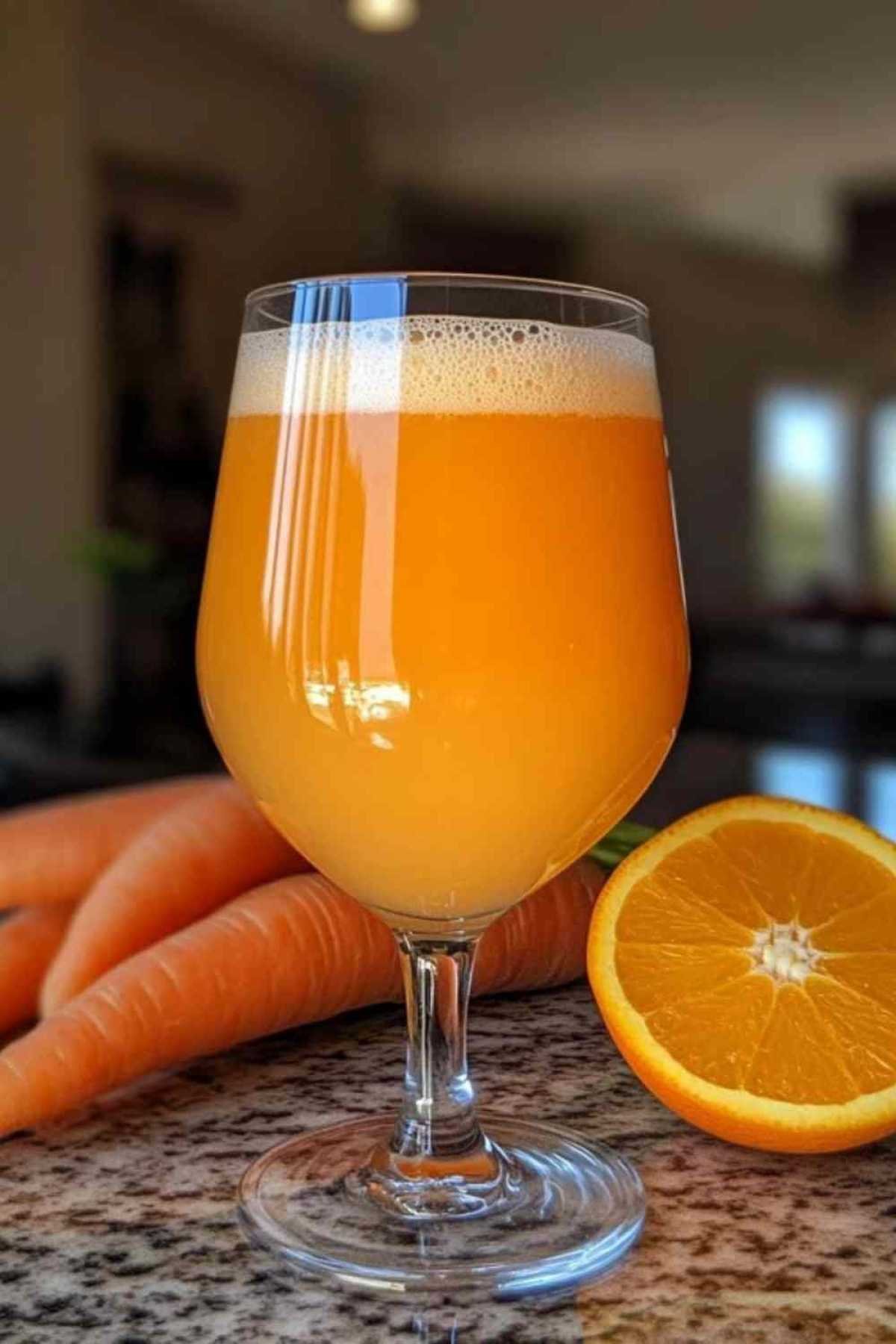 Ingrédients frais pour jus de carotte à l’orange
